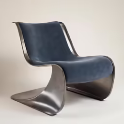 a chair with a metal frame that has a curved seat