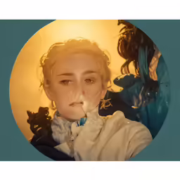 the woman is blowing bubbles and posing