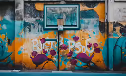 a picture of some colorful graffiti on a wall