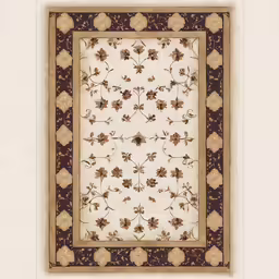 an elegant, beige and brown rug on a wall