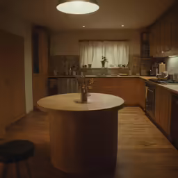 an image of a kitchen setting with stools