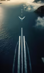 a jet airplane is flying over the ocean