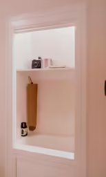 this is a shelf with items in it