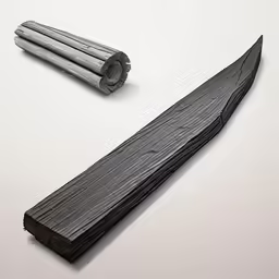 a black piece of wood with some type of scissors