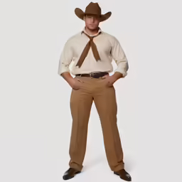 a man dressed in a brown cowboy hat and suit with his hands on his hips
