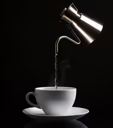 an empty cup and saucer on a dark background