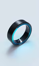 a black ring with a blue center in it