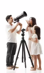 man and woman holding a telescope to look into each others eyes