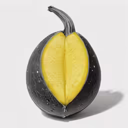 a single cut piece of fruit that has some sort of an egg