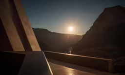 a man sitting in a chair on top of a roof