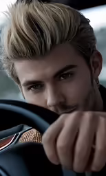 a man with his hair in the back of a car