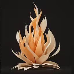 an orange paper flower on a black background