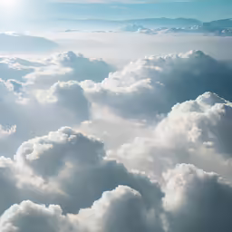 clouds in the sky and the sun shining through the clouds