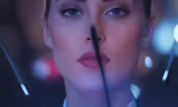 a close up shot of a woman with makeup
