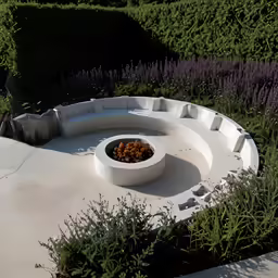 a concrete circle with circular seating around it