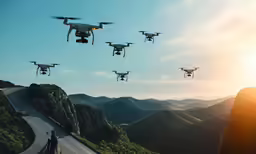 a group of people looking at an airport with many planes flying over them