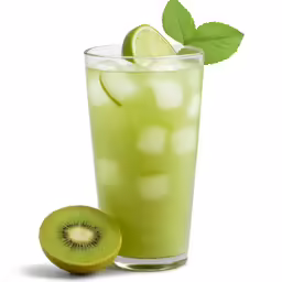 a glass filled with lemonade and green apple