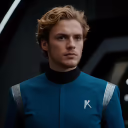 a man in a uniform stares at the camera