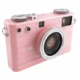 pink camera sitting on top of a table