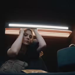 a beautiful woman in the middle of the night