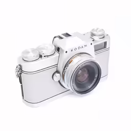 a camera on top of a white table